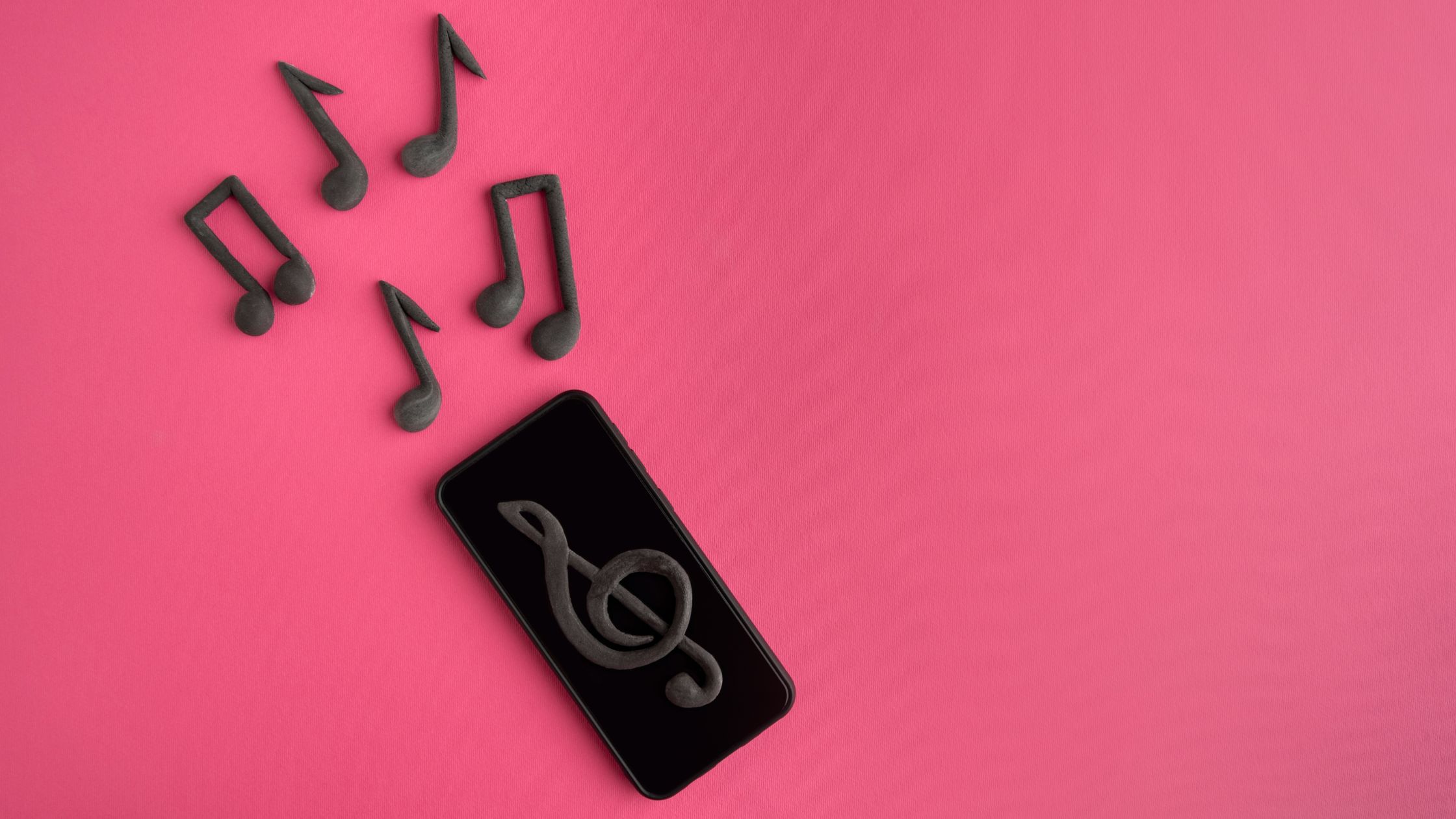 music notes coming out of mobile