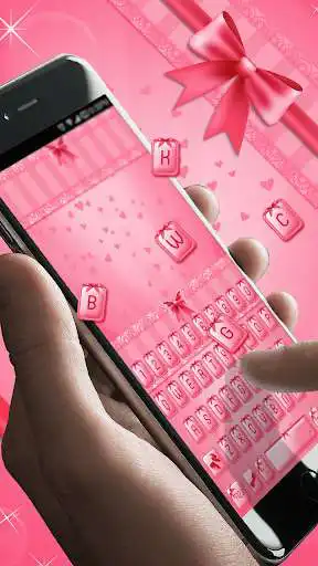 Play APK Pink Bow Keyboard Skin  and enjoy Pink Bow Keyboard Skin with UptoPlay emoji.keyboard.emoticonkeyboard