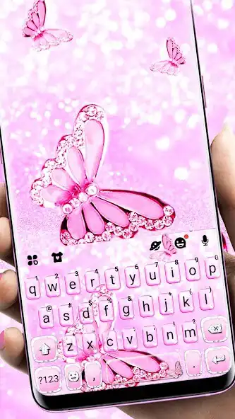 Play Pink Shiny Butterfly Keyboard Background  and enjoy Pink Shiny Butterfly Keyboard Background with UptoPlay